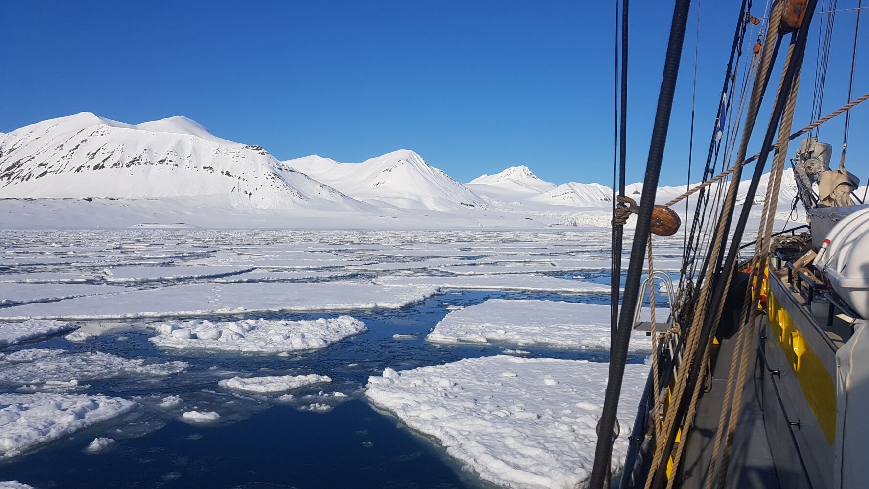 Sailboat in icy sea