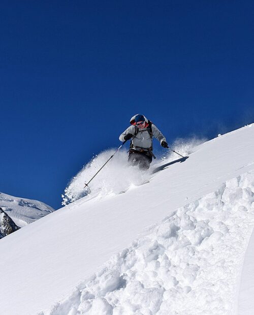 A skier shredding fresh Chamonix power