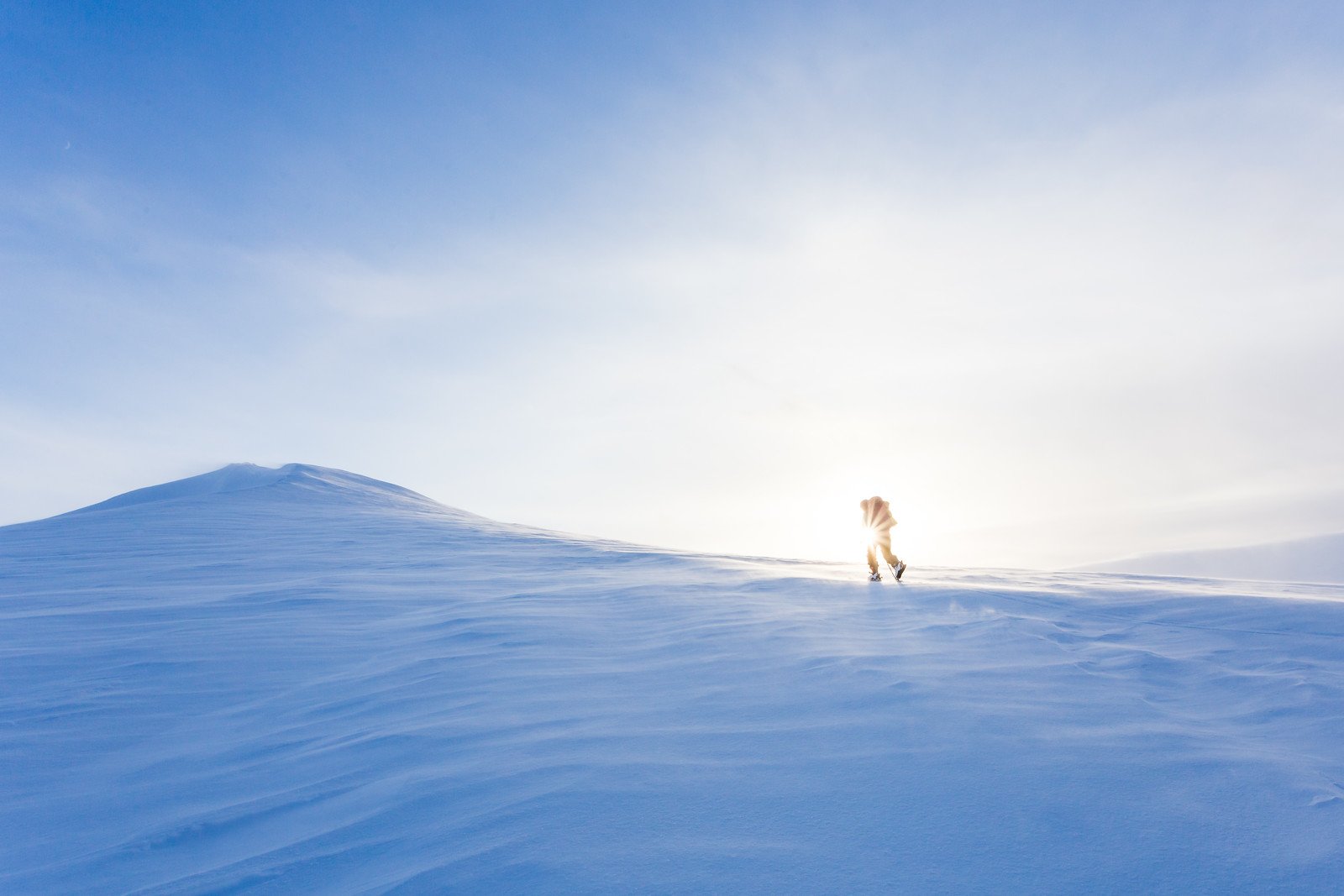 Skier going uphill in Svalbard