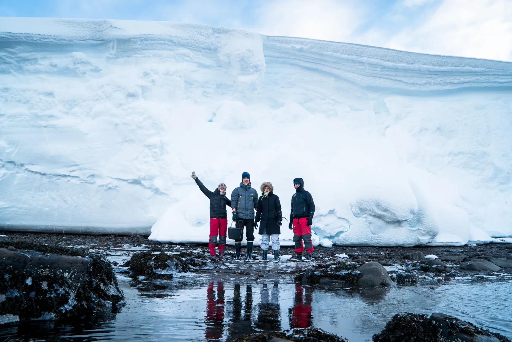 Skiers happily posing for a pic in the Westfjords.