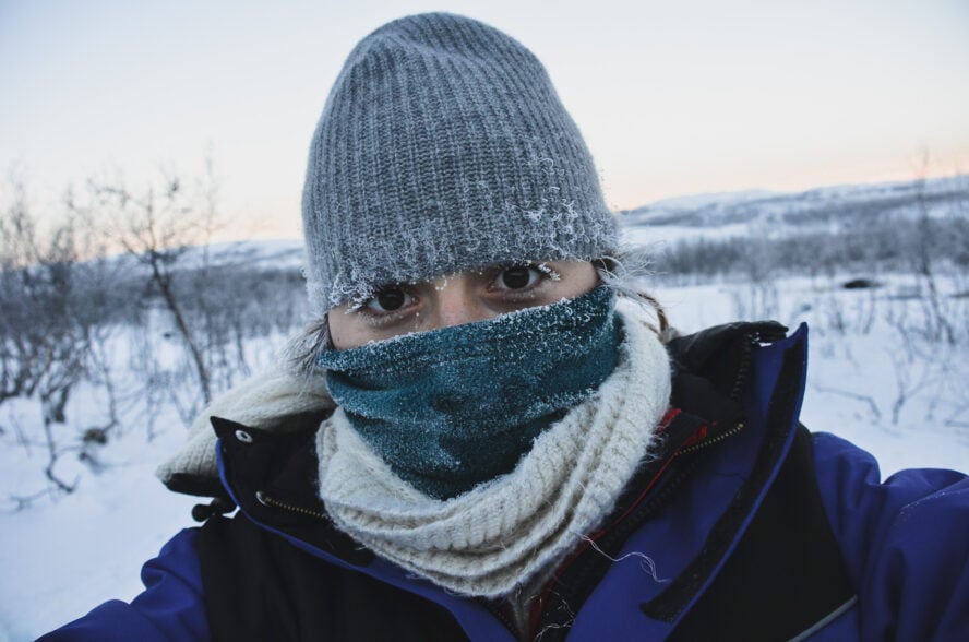 Tate Drucker tinged with frost on a winter day in Iceland.