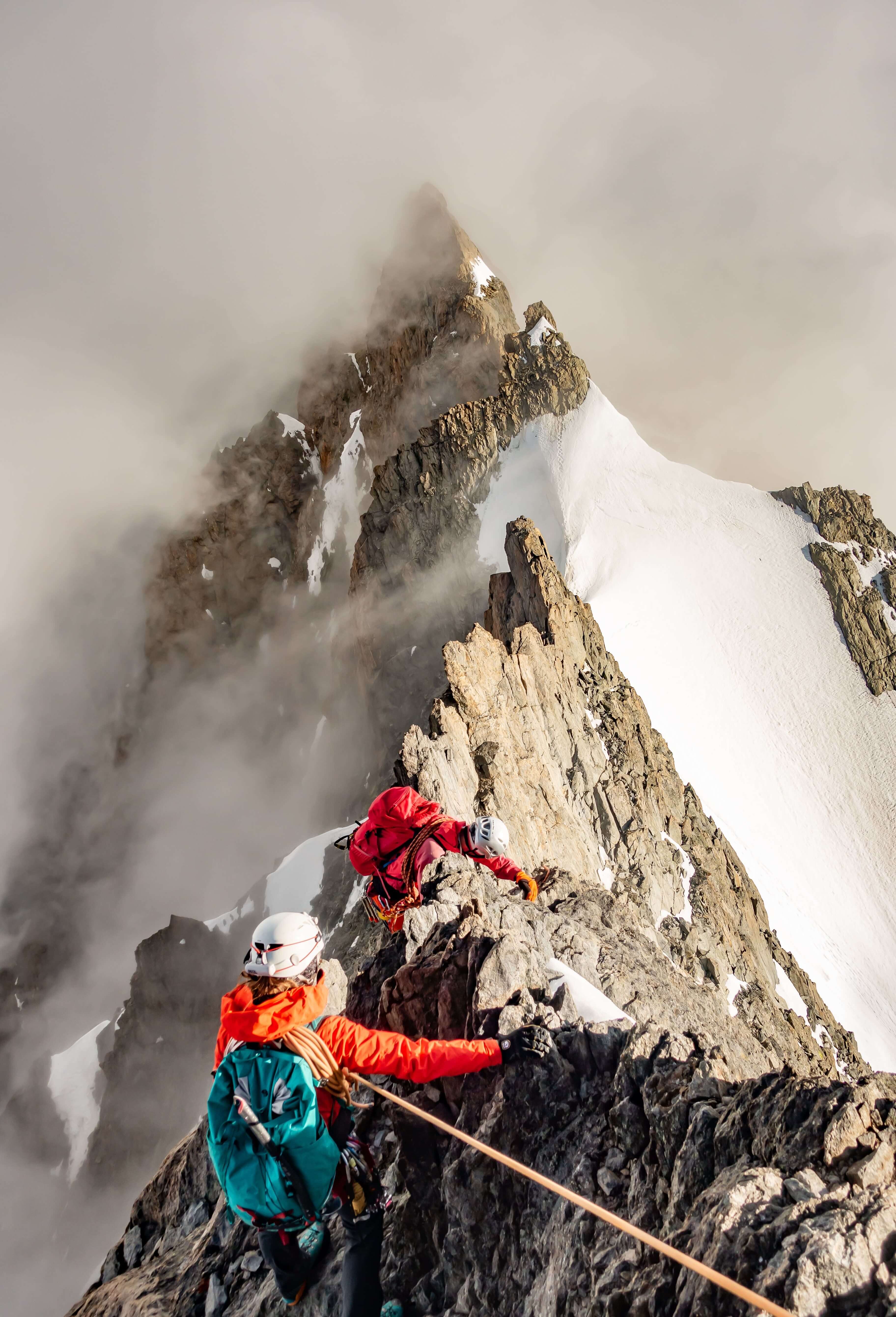 Alpine climbers on a serrated ridge