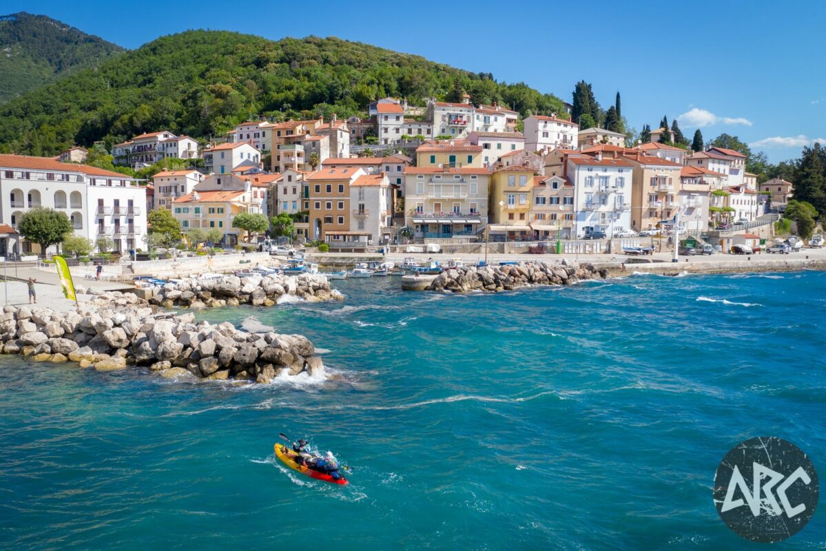 Sea kayaking near a coastal town in Dalmatia