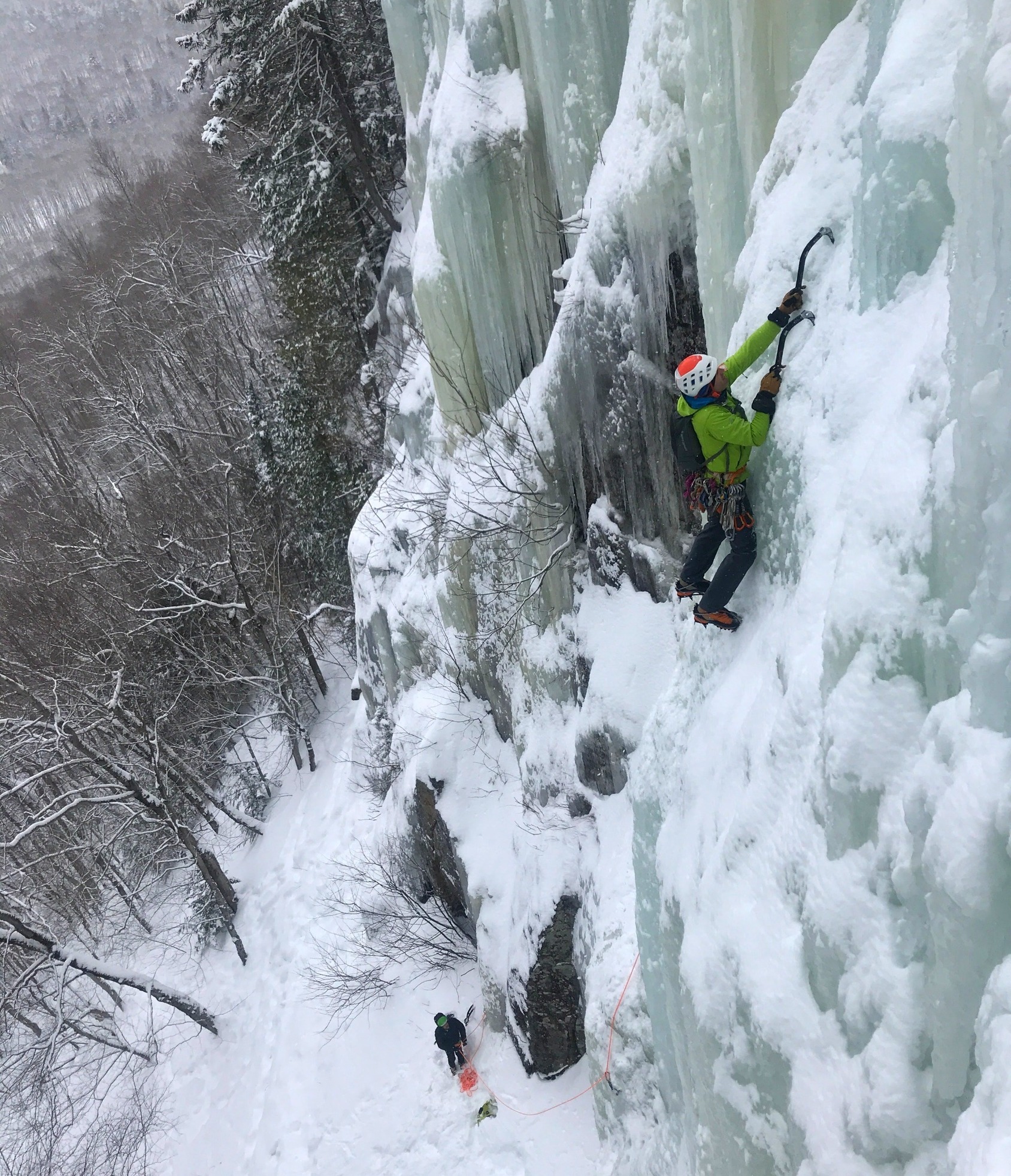 An ice climber on a wall in Franconia Notch, New Hampshire.