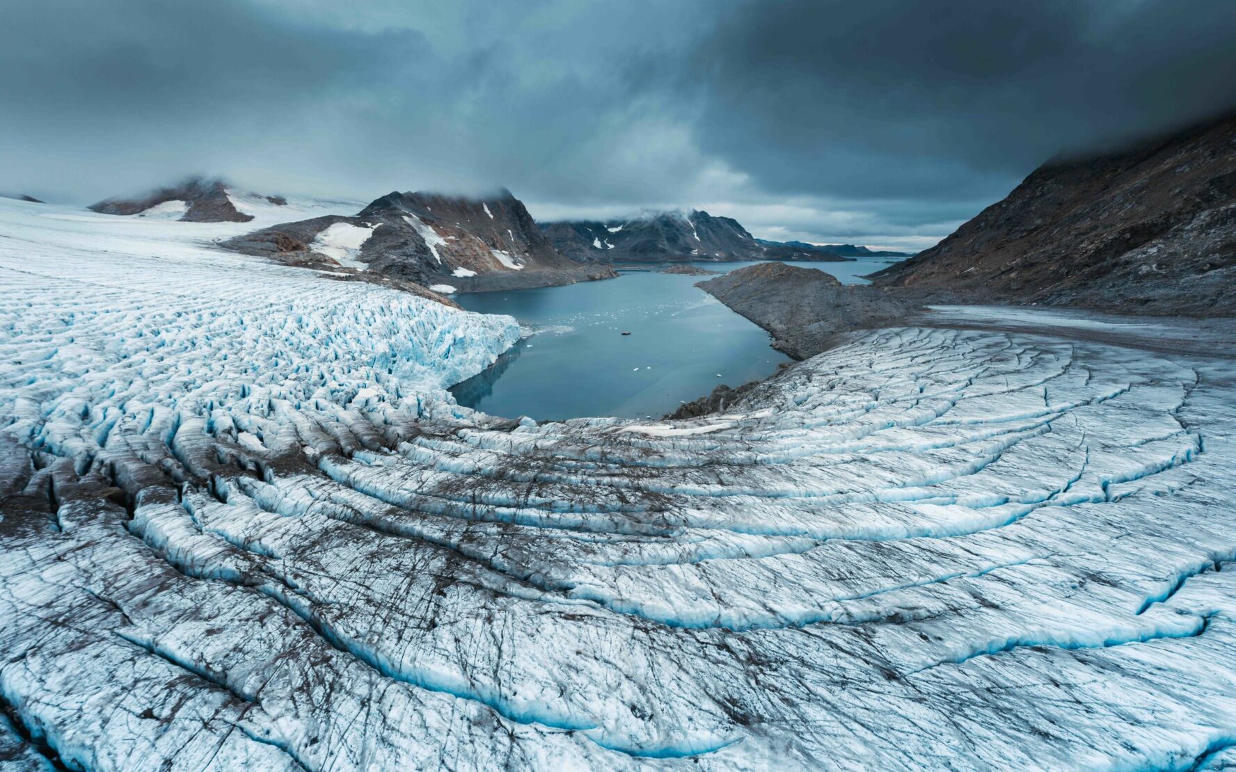 A glacier and a view of the Greenland ice cap.