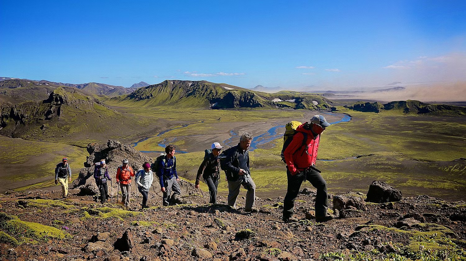 Group walking the volcanic trails