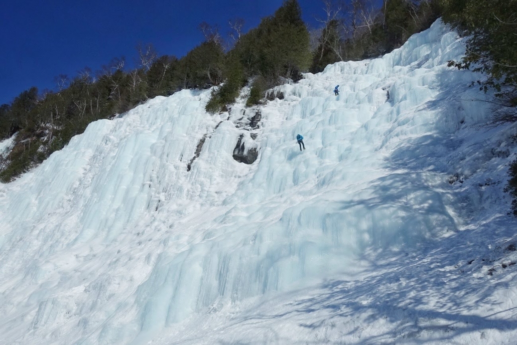 A view of several ice climbers on Lake Willoughby, New Hampshire.