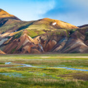 Pastures at the foot of rhyolite hills in Landmannalaugar.