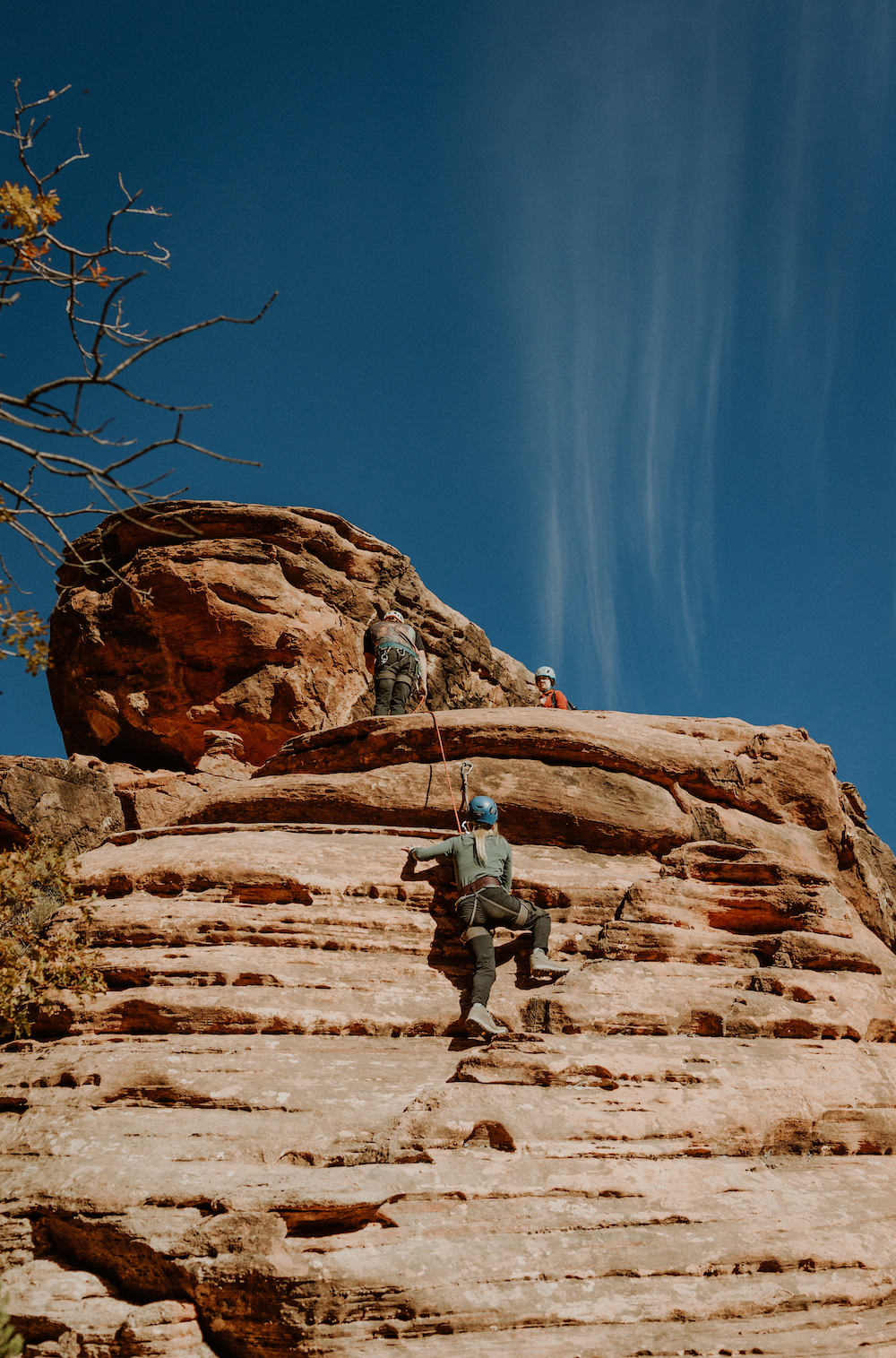 A rock climber doing a single-pitch route in Zion.