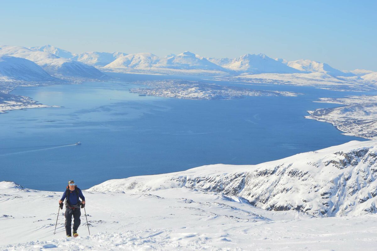 A skier in Norway on a skiing and sailing trip