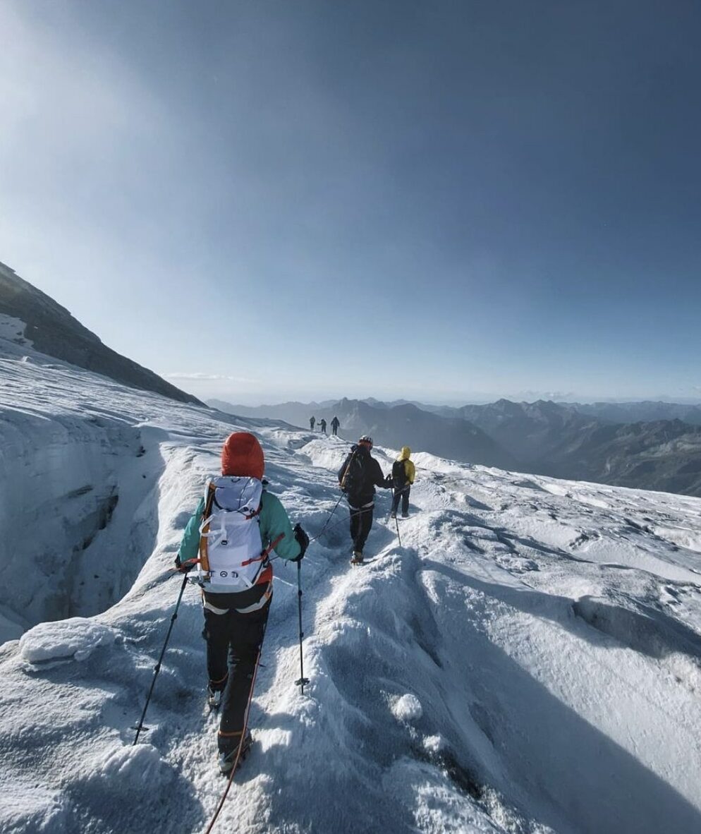A line of climbers on a glacier walk Source: Guide (Webinar)