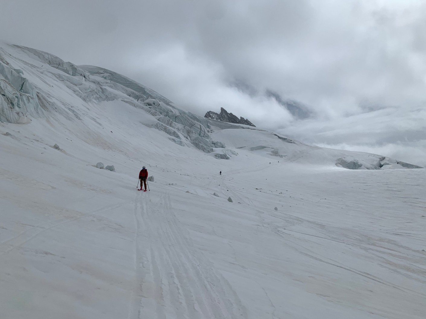 A backcountry skier among the glacial landscapes in the Valpelline Valley.