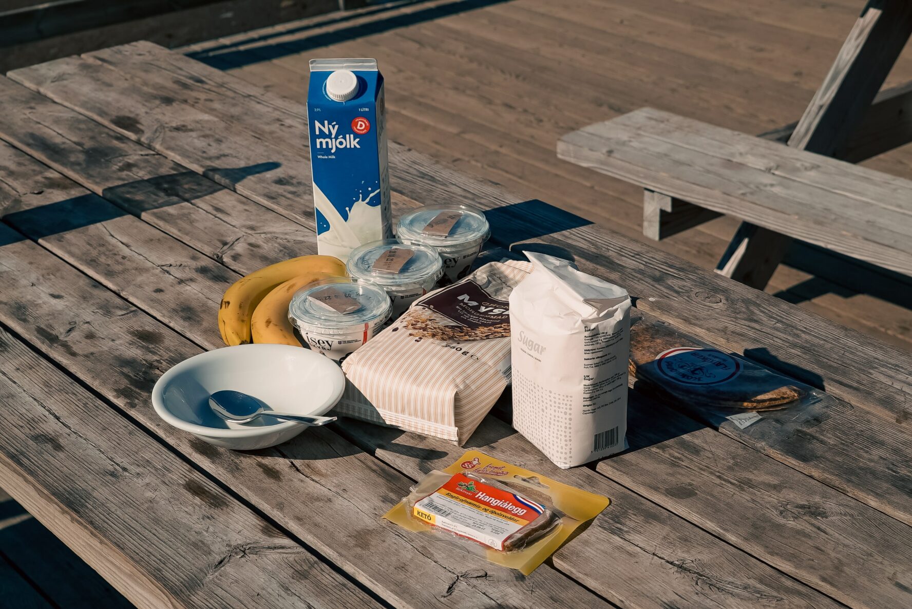 Simple, yet effective breakfast for hikers—milk, yoghurt, oatmeal, bananas