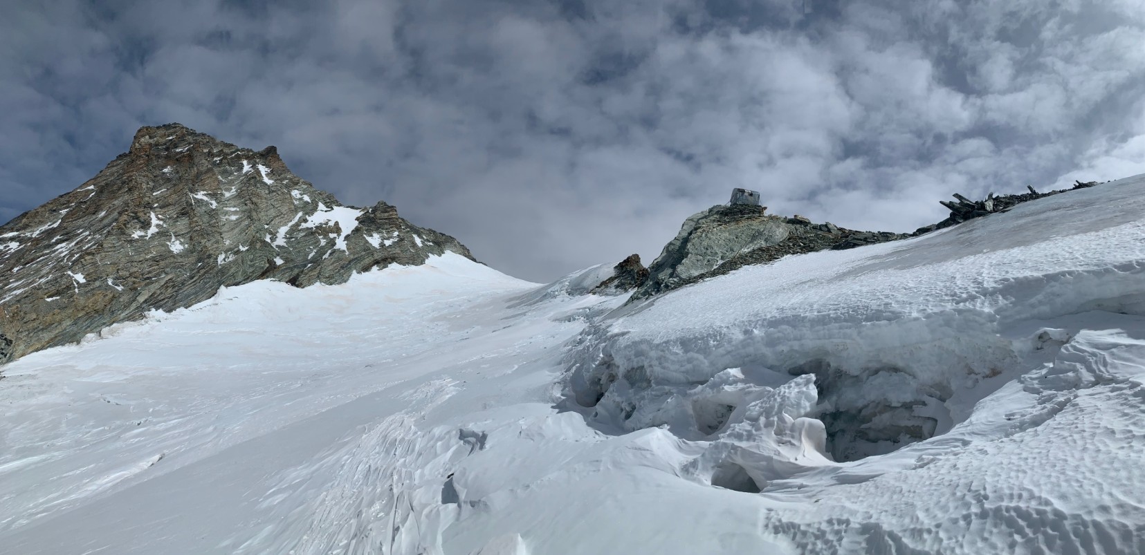 View of an Alpine slope in the Valpelline Valley with hard crust snow.