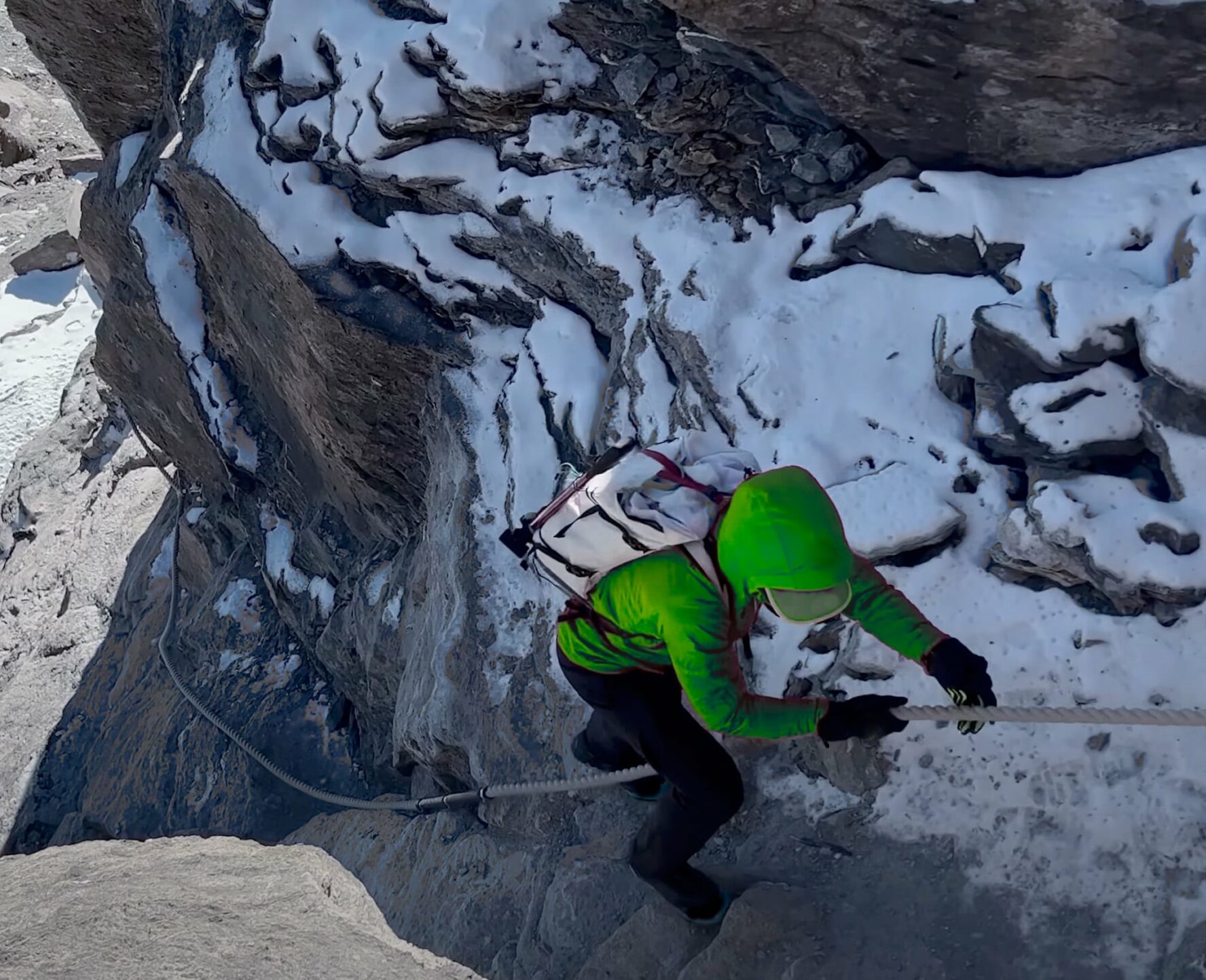 A person scrambling up a route Source: Guide (Webinar)