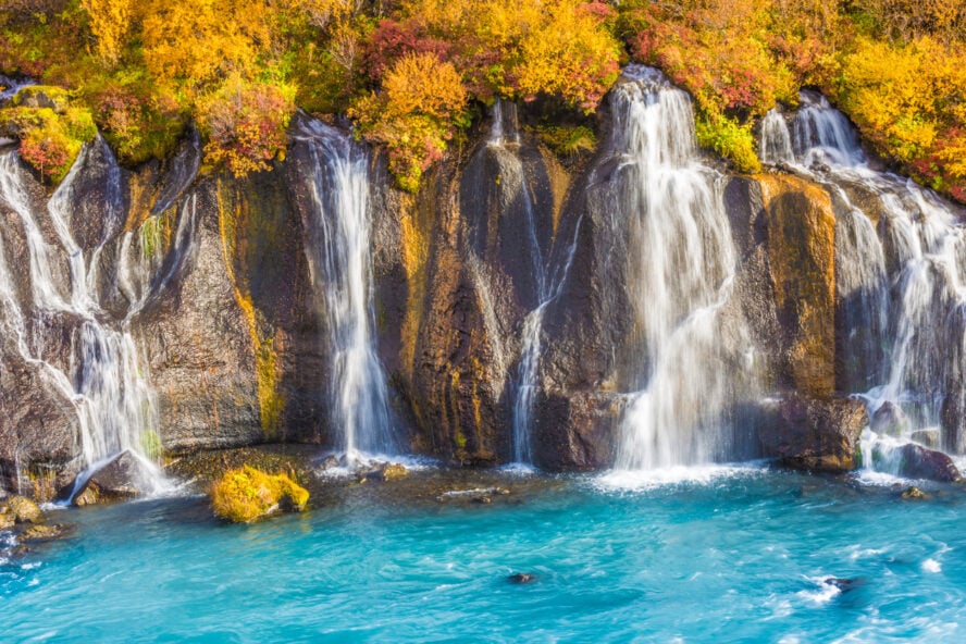 The Hraunfossar waterfalls streaming out of the Hallmundarhraun lava field near Reykholt