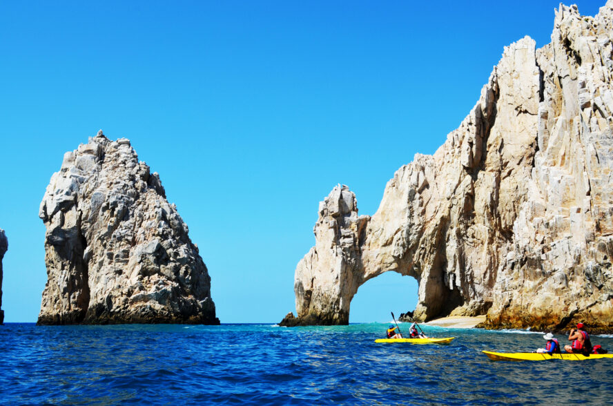 Kayakers among the unique stone formations of Los Cabos in Mexico’s Baja California.