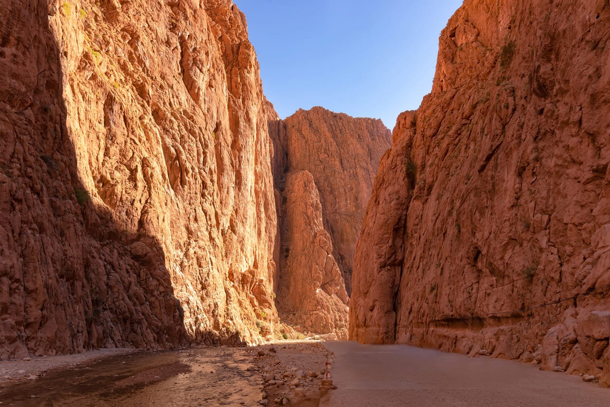 A view of the narrow river canyon with steep and very high walls in the Todgha Gorge area in Morocco.