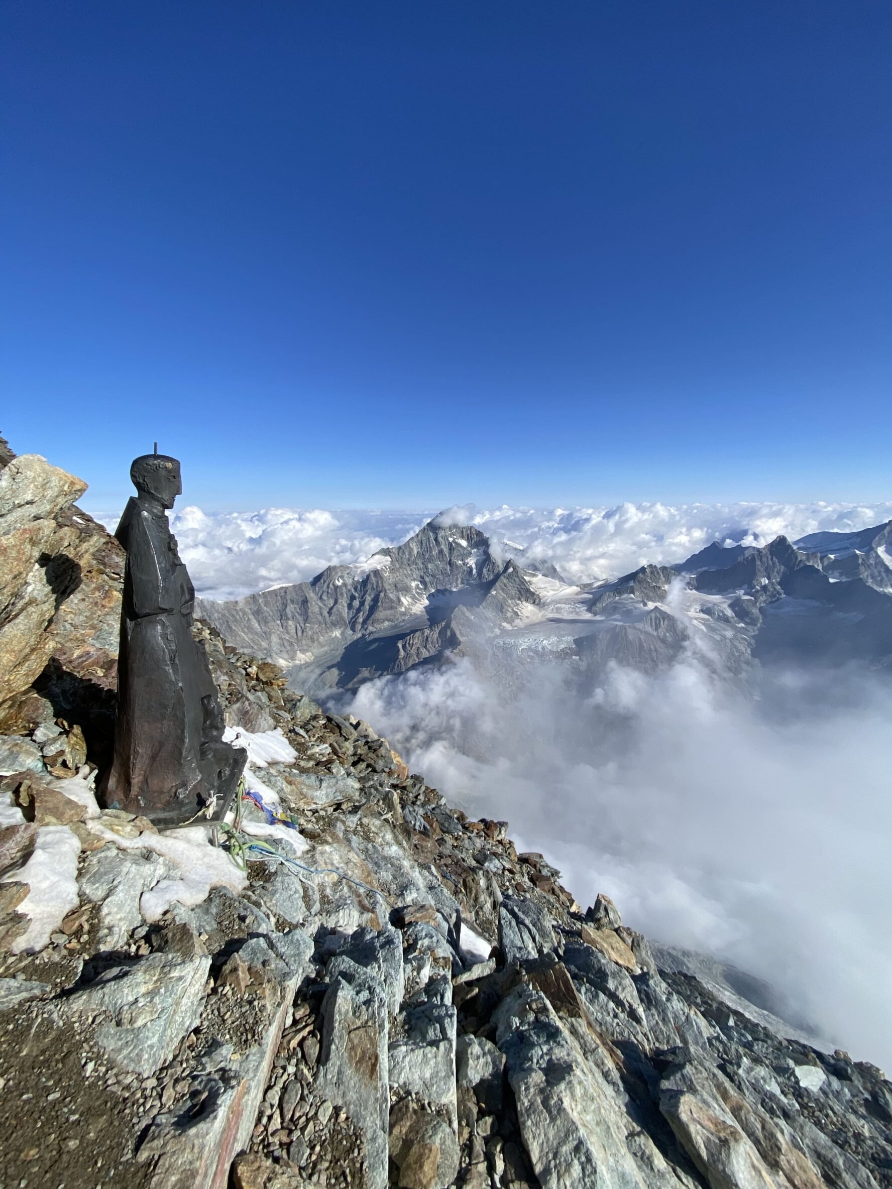 Near the summit of the Matterhorn on the Hörnli Ridge route is a statue of Saint Bernard. Source: Guide (webinar)