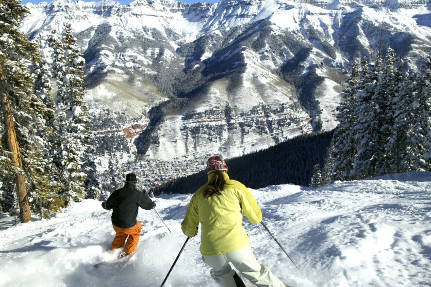 skiers going downhill in Telluride, Colorado