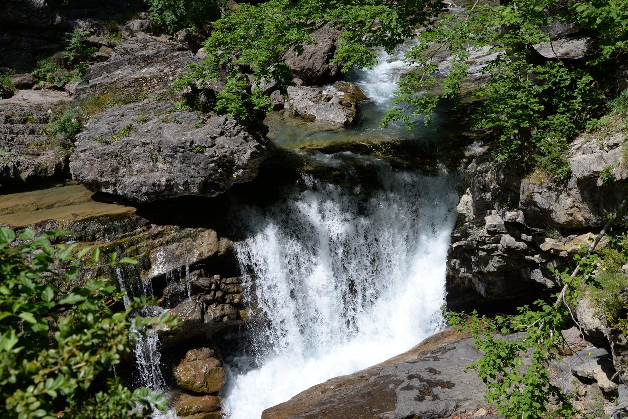 A waterfall of the Duraton river near Madrid seen during a canyoning adventure.