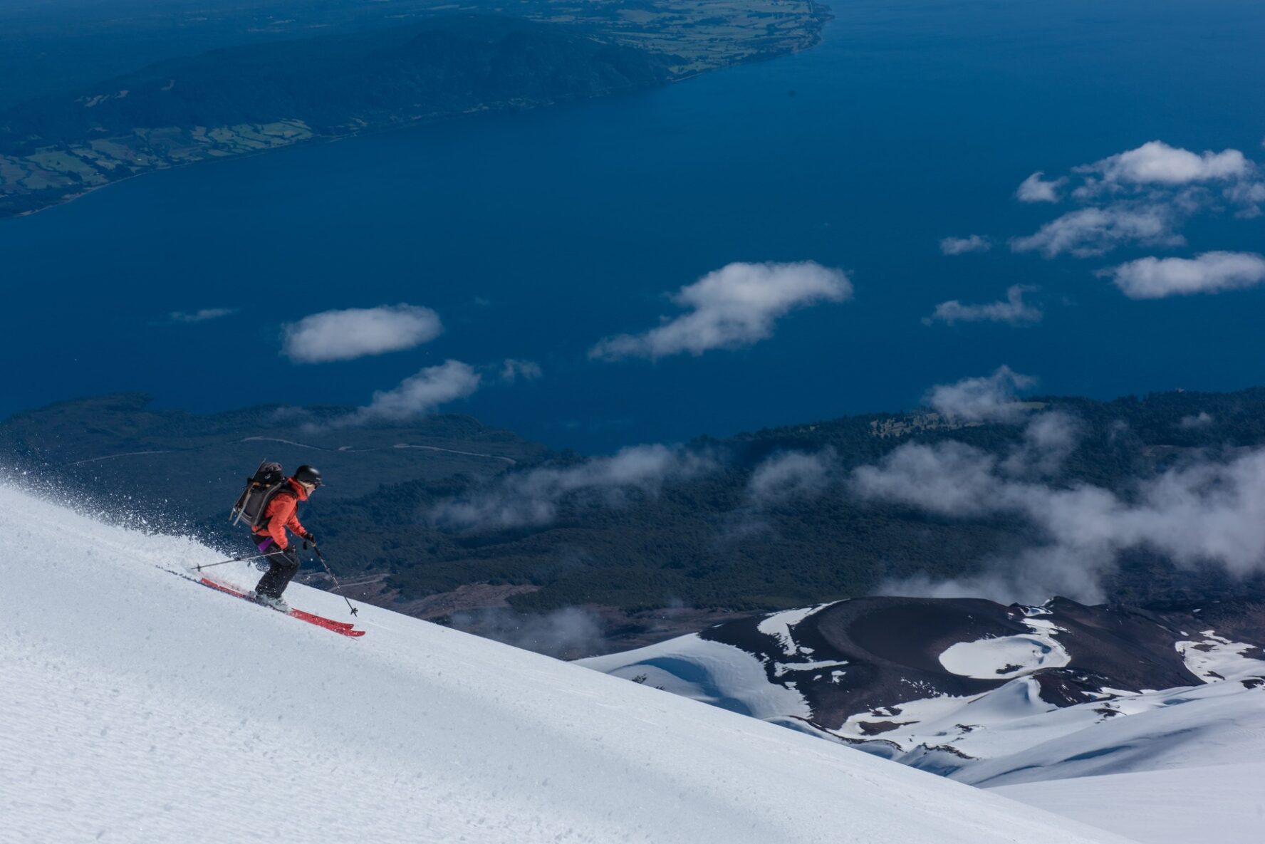 A side view of a backcountry skier in Chile