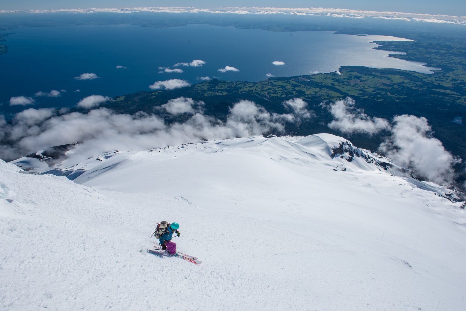 A skier on a slope overlooking Chile’s lake district.