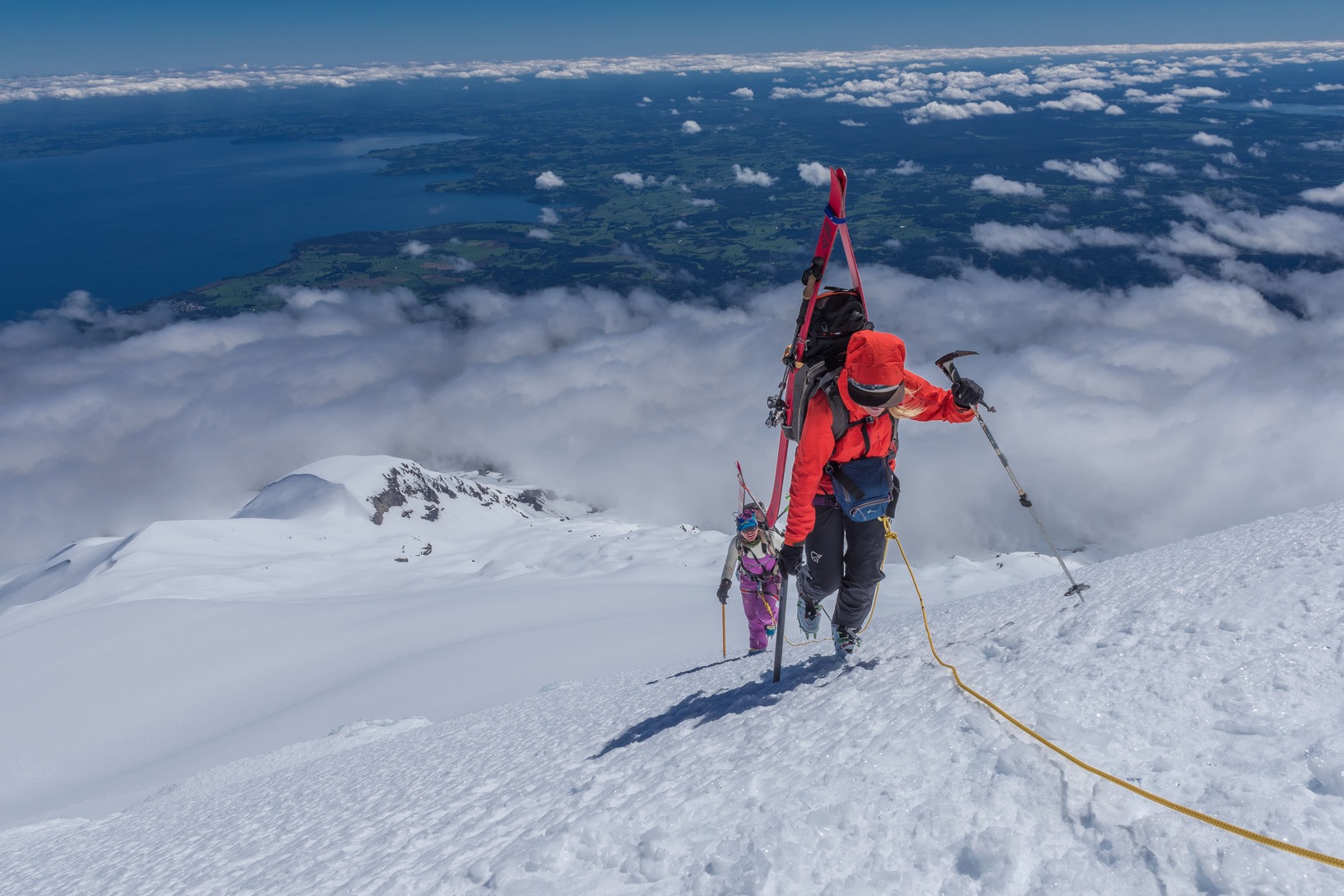 Skiers cramponing in a line on Chile’s steep volcanoes.