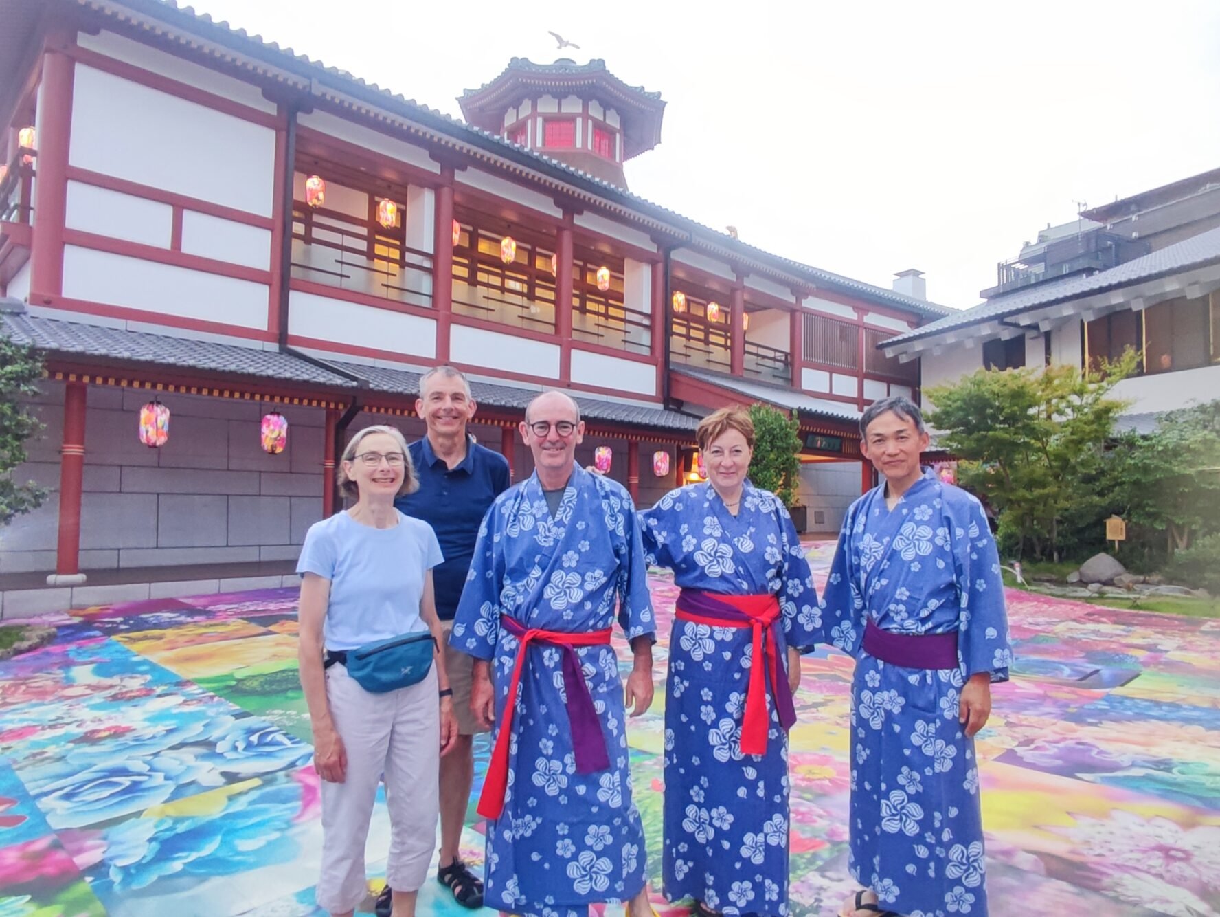 People dresses in traditional kimono posing for a photo before tea ceremony