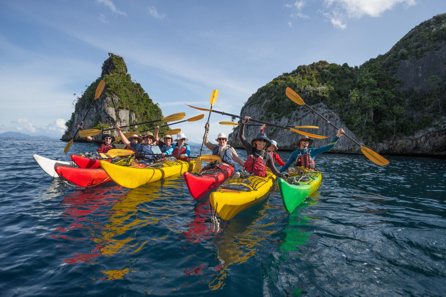Kayakers in Raja Ampat, Indonesia.