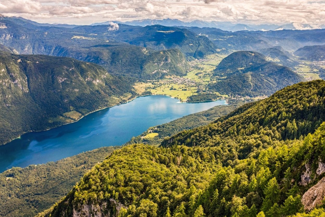 View of Lake Bohinj and surrounding landscapes in Slovenia’s Julian Alps as seen from the Vogel Plateau near Bled.