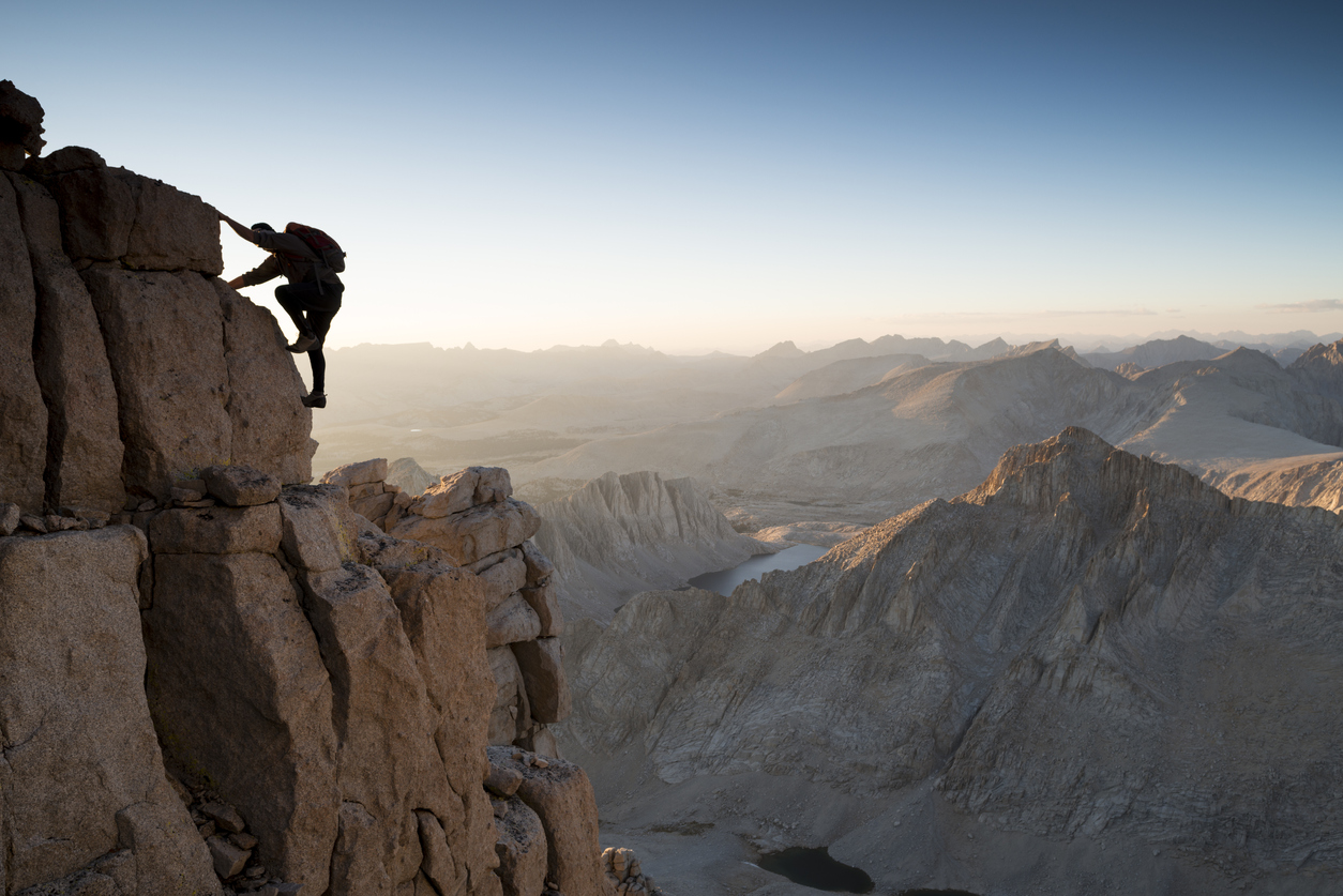An alpine climber approaching the summit of Mt Whitney.