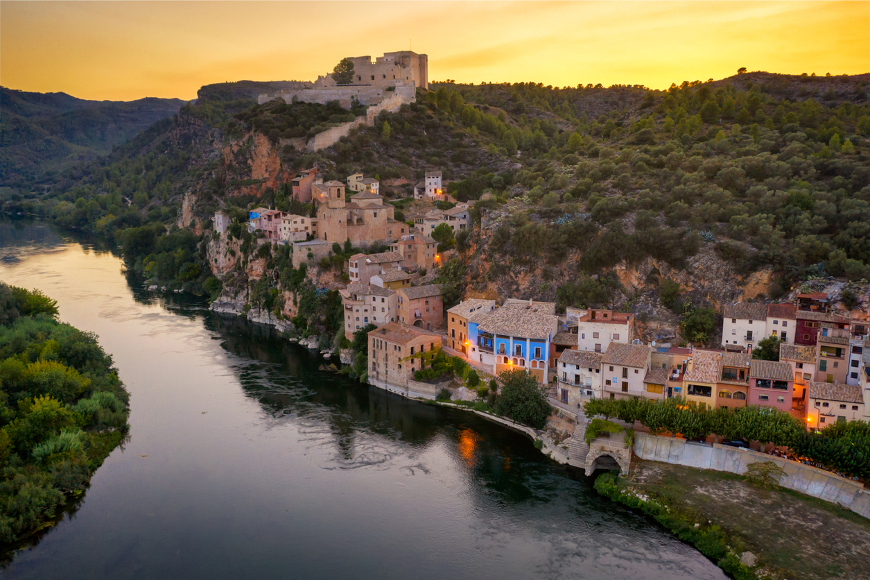 Aerial view of the village of Miravet at the Ebro river in Tarragona at sunset, Catalonia. Spain