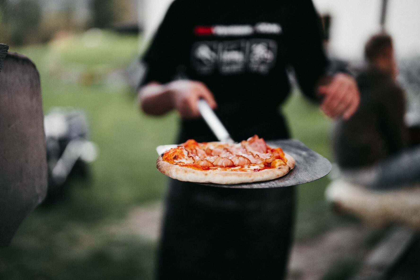 Chef preparing a pizza