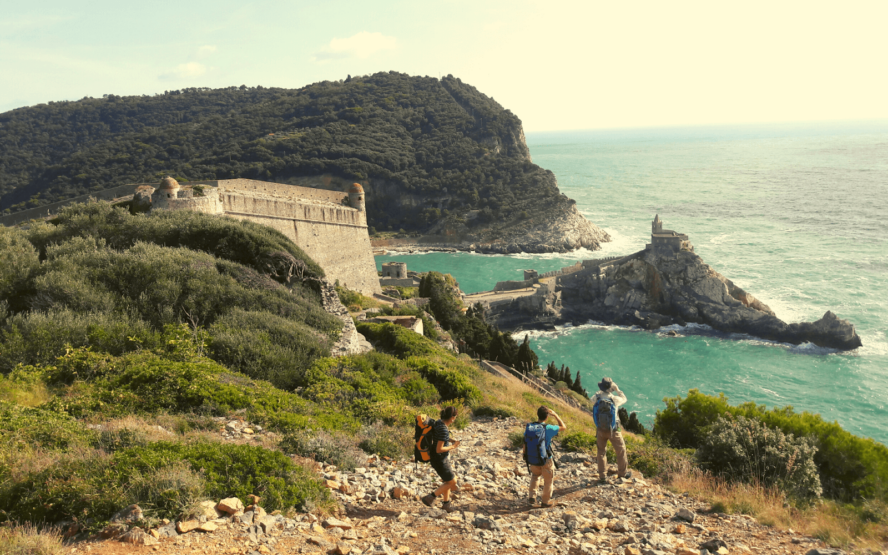 Doria Castle in the bay of Porto Venere, its dark stone in sharp contrast to the aquamarine water.