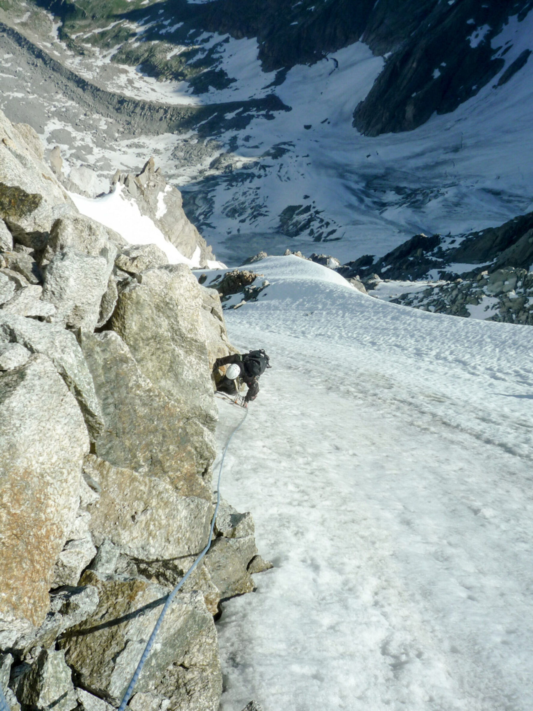 Ice climbing on a steep climbing route in the Chamonix area
