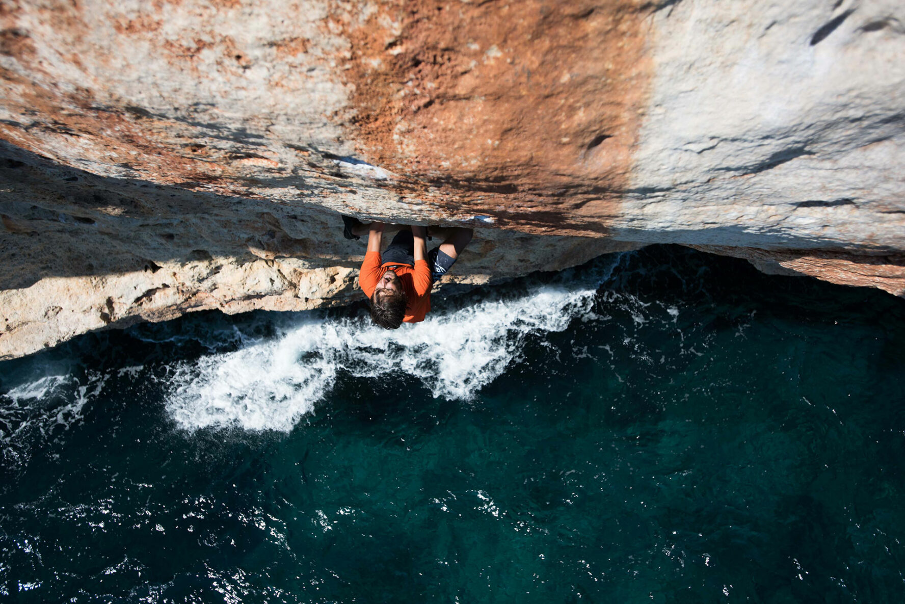 Climbing a vertical wall in Mallorca