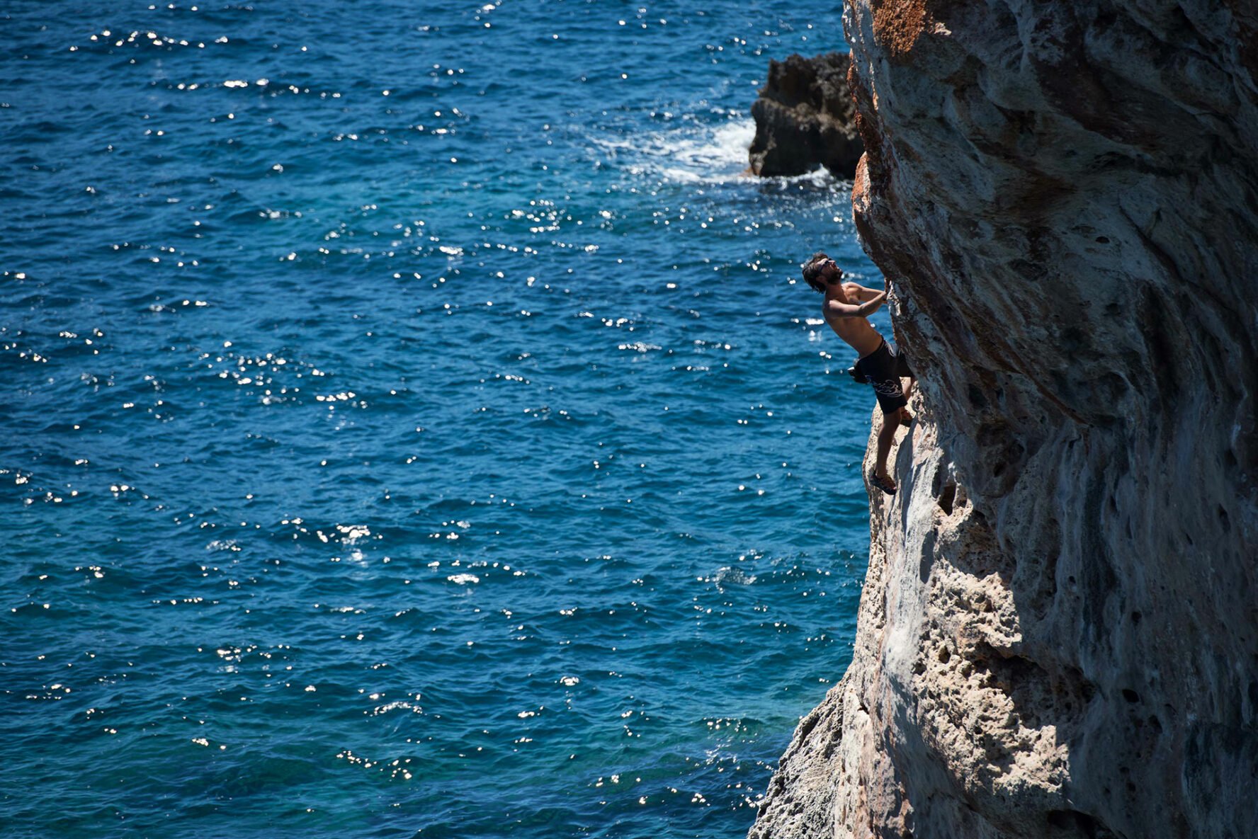 Rock climber on a crag in Mallorca