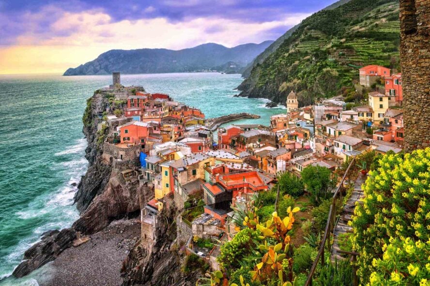 The ridge of Vernazza in Cinque Terre, Liguria, Italy, overlooking the coast at sunset.