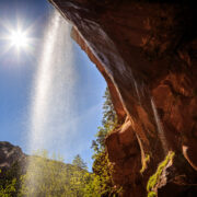 This glistening waterfall feeds the pools below.