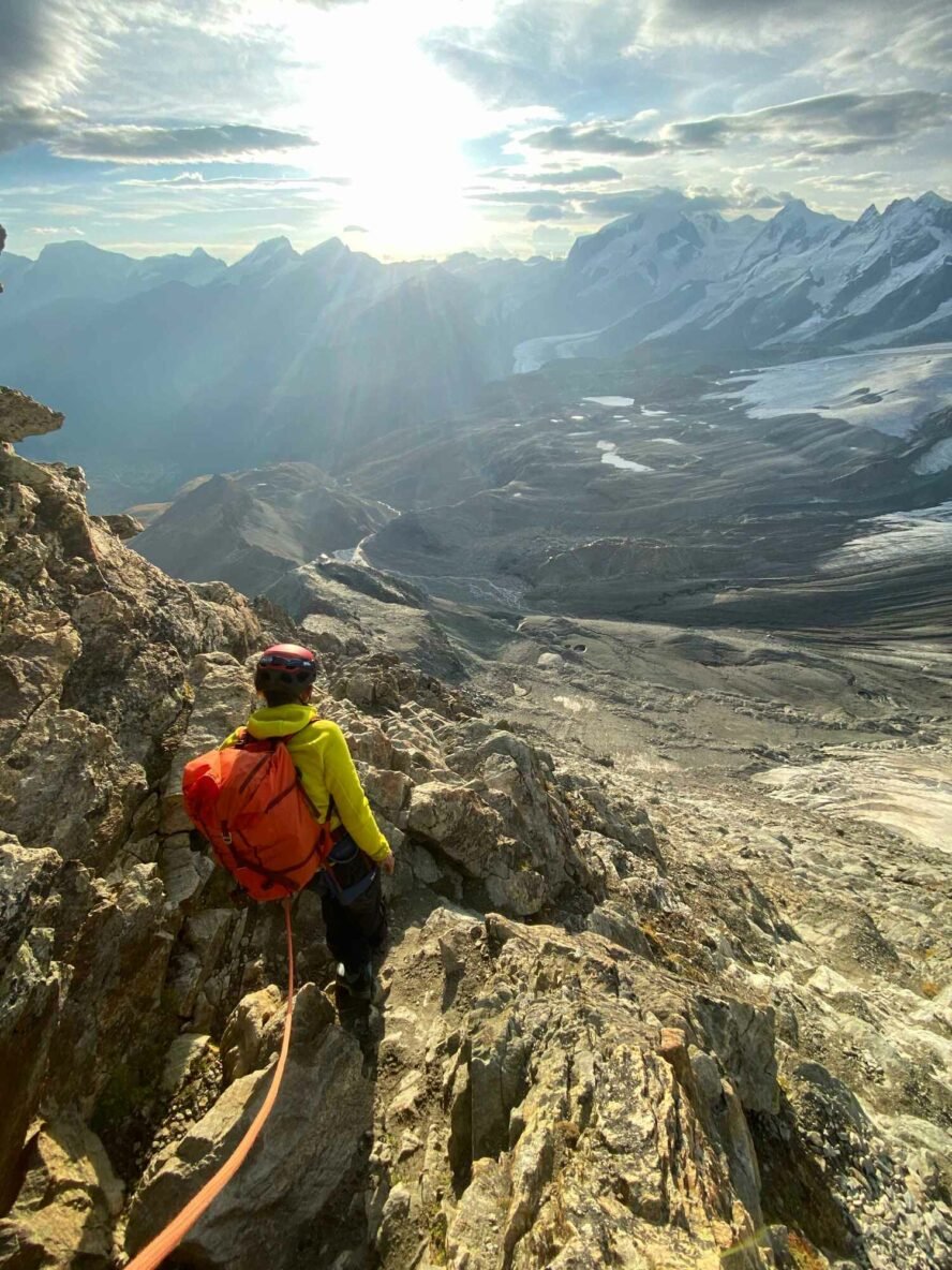 A climber overlooking the ridge out onto Zermatt Valley.