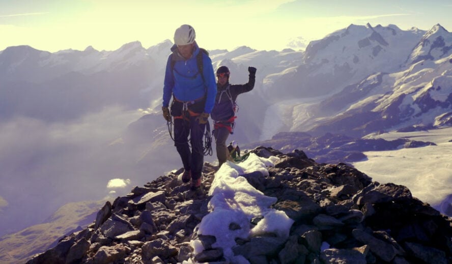 Two climbers on the summit of Matterhorn.