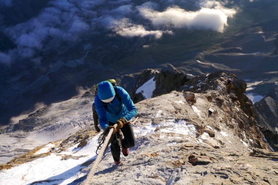 Climbing ascending a fixed rope on Matterhorn. 