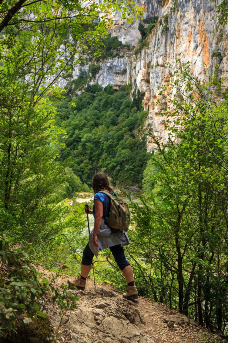 A hiker walking in the Verdon Gorge.