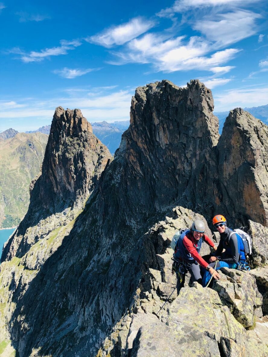 Two climbers enjoying a sunny day out on the Traversée des Perrons.