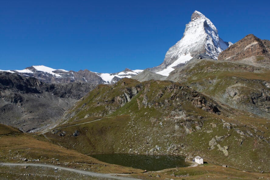  Lake Schwarzsee in the foreground, diminutive against the snow-faced Matterhorn in the background.