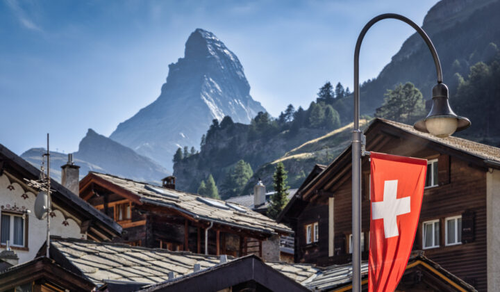 Swiss town of Zermatt, last stop of the Haute Route, with wooden houses and the view of Matterhorn.