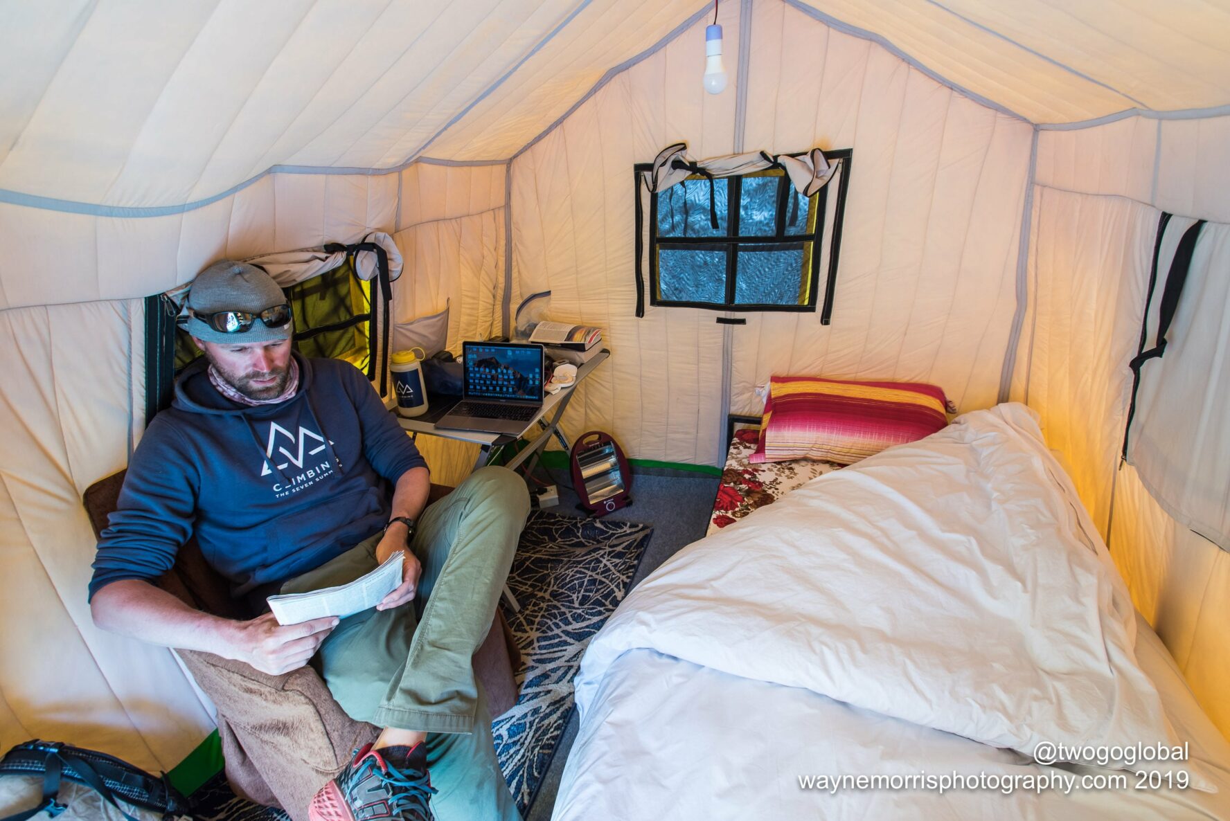 CTSS on the inside. A bed, nightstand, chair and spacious room to rest in