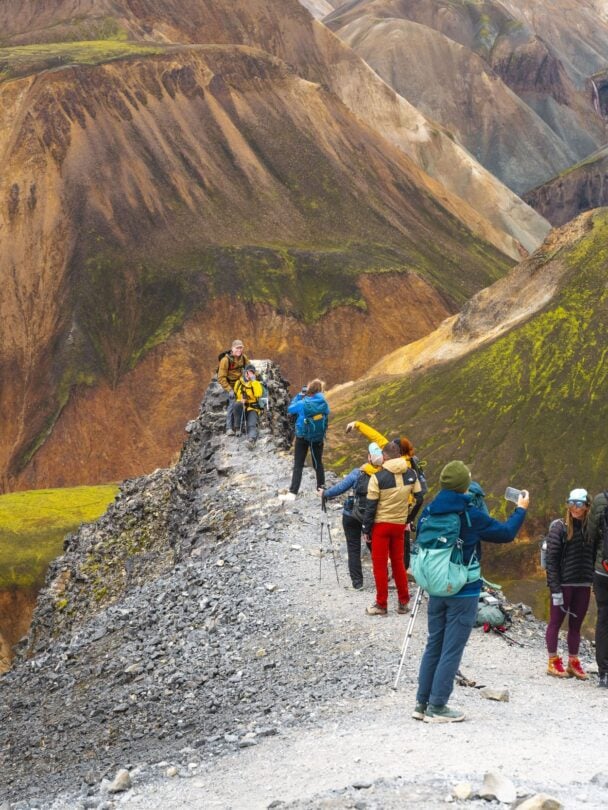 happy group taking photos on laugavegur
