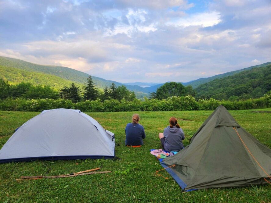 Hikers and pitched tents on the Appalachian Trail